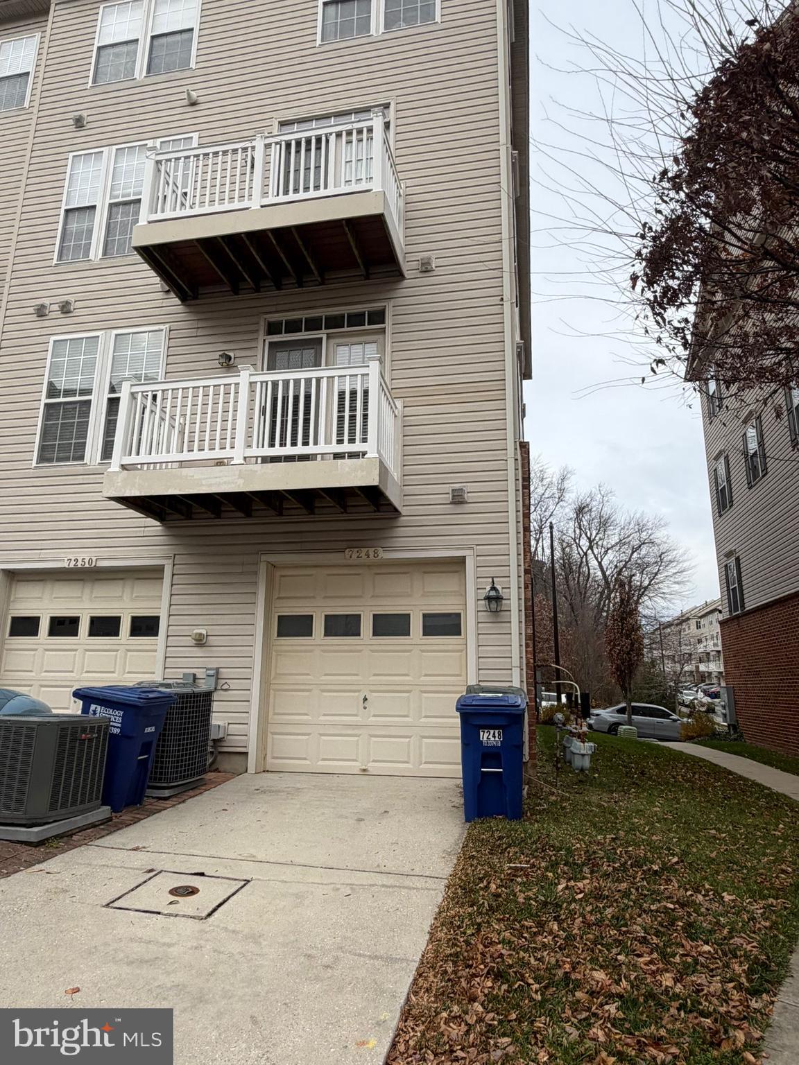 7248 Elkridge Crossing Way Elkridge, MD 21075 - Photo 44 of 47 a view of a house with a yard