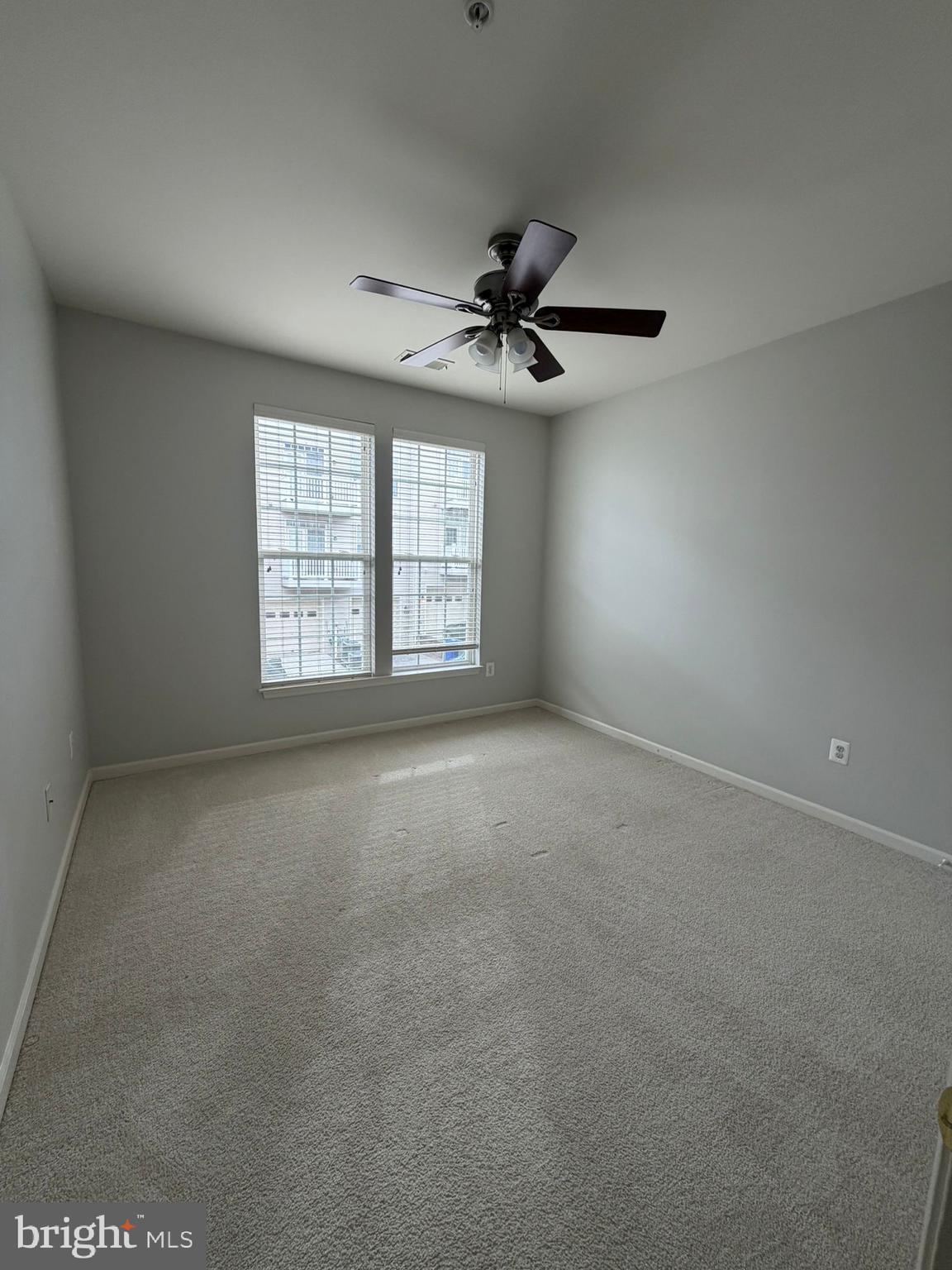 7248 Elkridge Crossing Way Elkridge, MD 21075 - Photo 46 of 47 a view of an empty room with a window