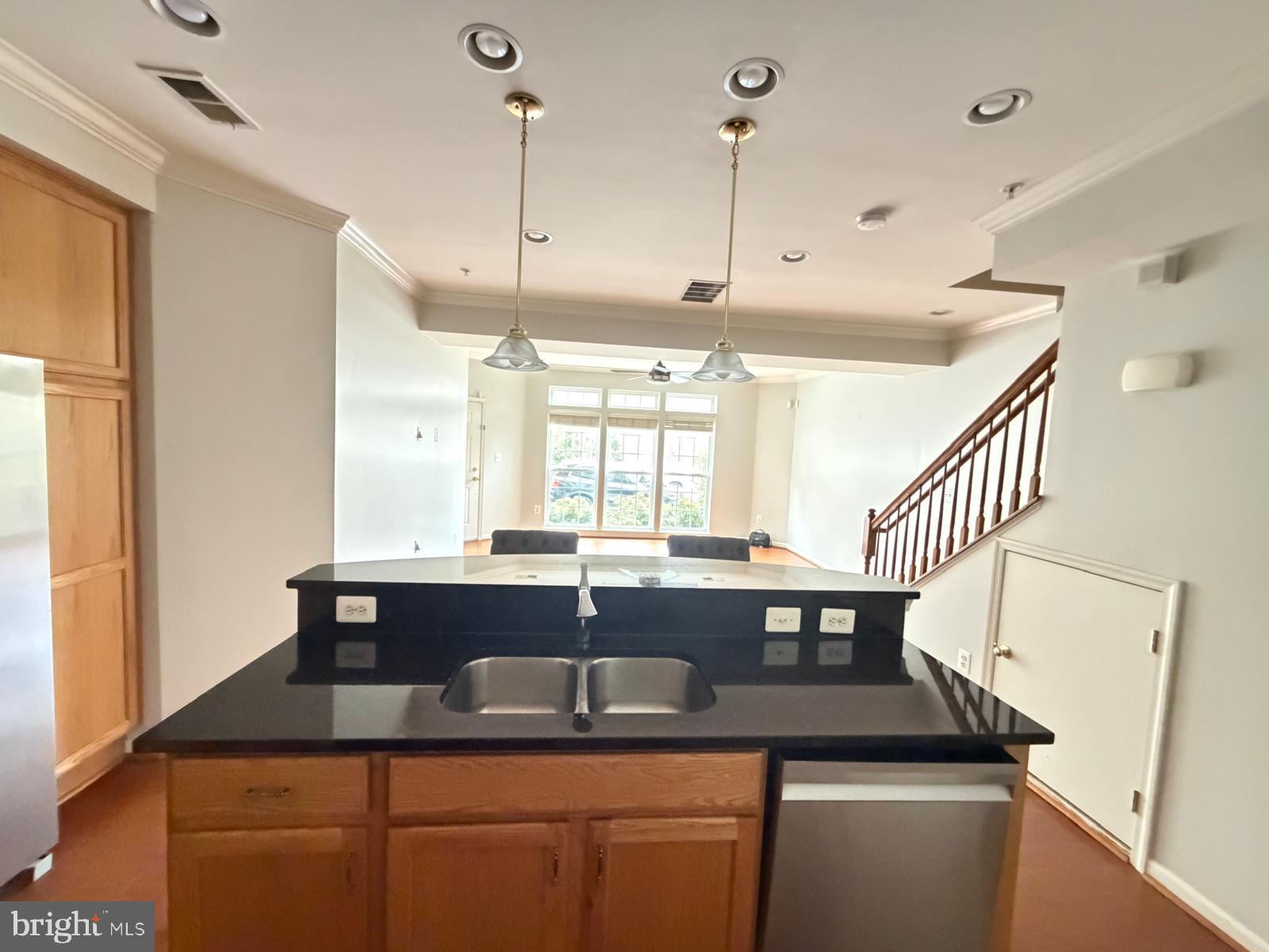 7248 Elkridge Crossing Way Elkridge, MD 21075 - Photo 8 of 47 a kitchen with a sink appliances and a counter top space