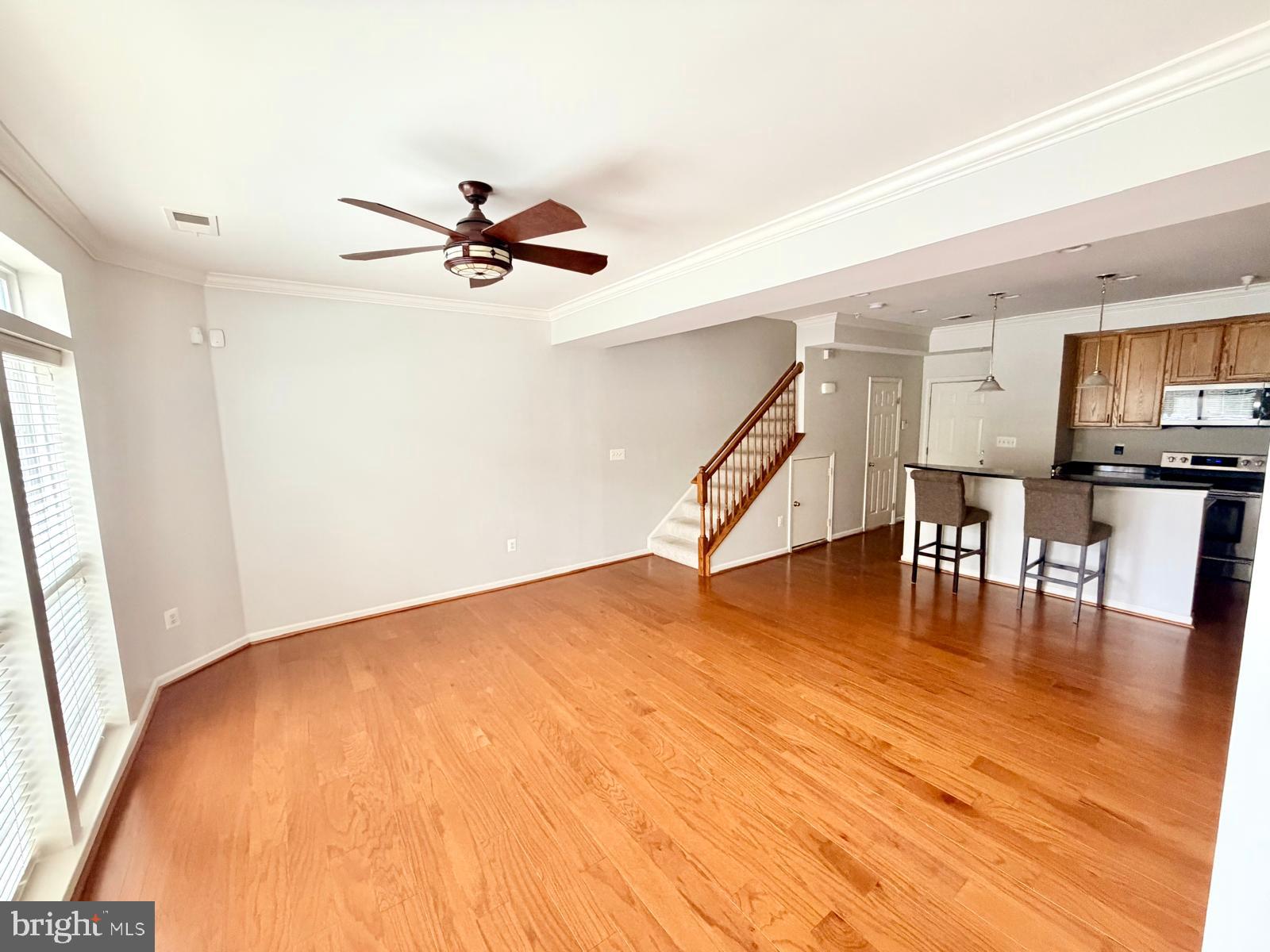 7248 Elkridge Crossing Way Elkridge, MD 21075 - Photo 10 of 47 a view of a livingroom with furniture and wooden floor