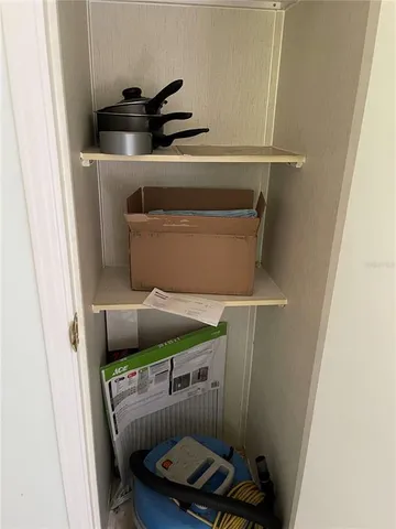 a view of a balcony with wooden floor