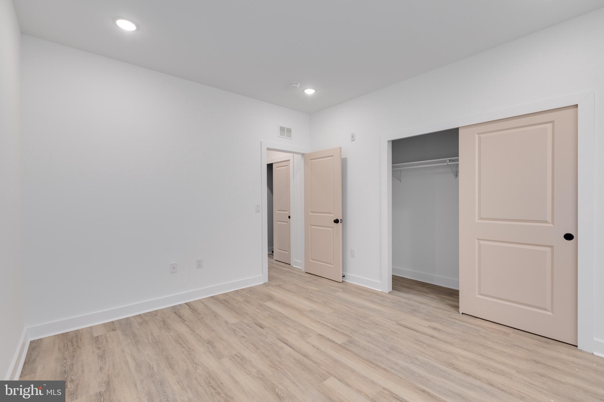 2061 North 8th Street, Unit 3 Philadelphia, PA 19122 - Photo 5 of 11 a view of hallway with wooden floor