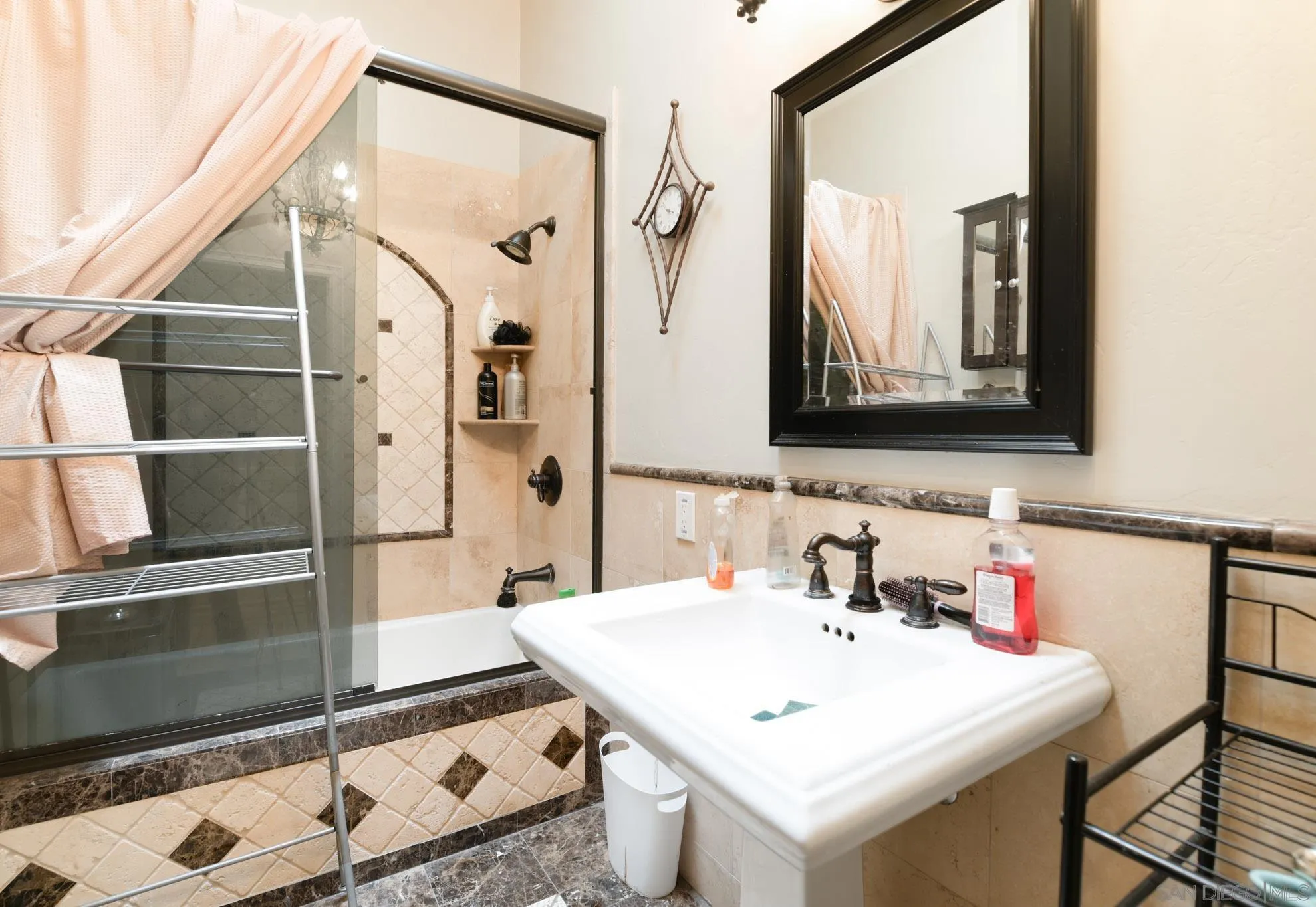 30015 Ridge Creek Road Valley Center, CA 92082 - Photo 16 of 59 a bathroom with a sink and a mirror