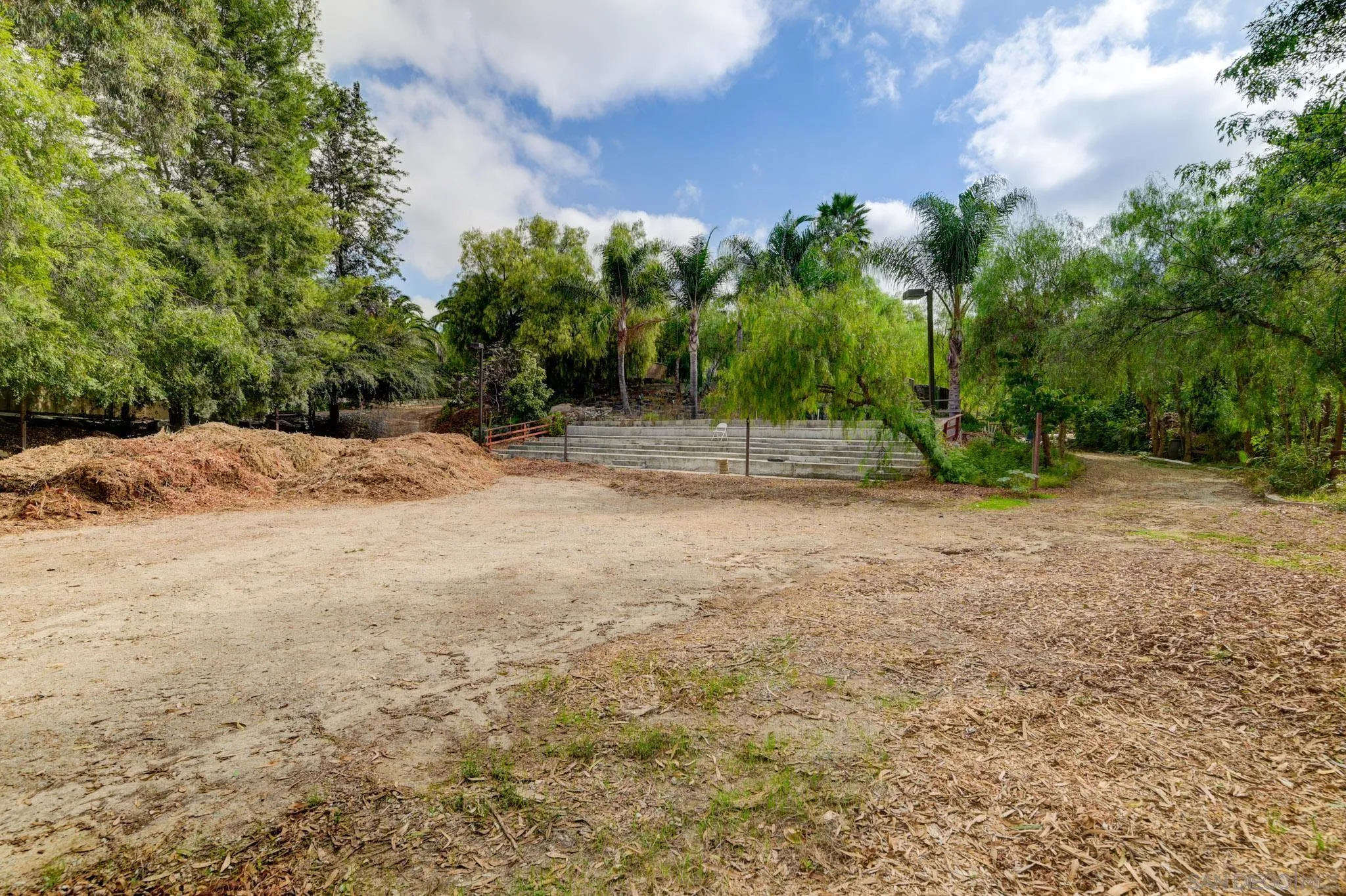30015 Ridge Creek Road Valley Center, CA 92082 - Photo 25 of 59 a backyard of a house with lots of green space