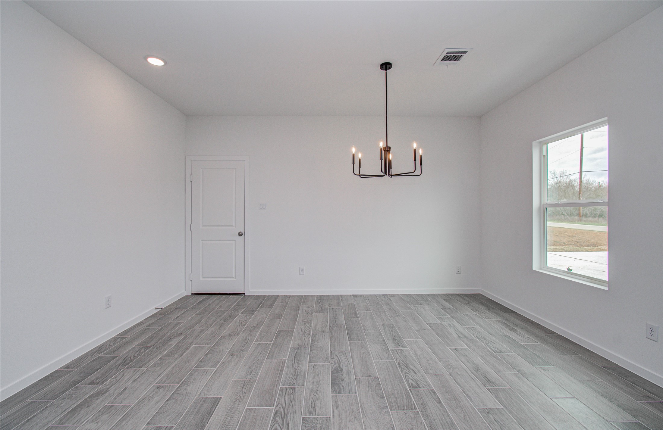 211 19th Hempstead, TX 77445 - Photo 14 of 21 Dining Area
Elegant dining space featuring modern lighting and a welcoming atmosphere.