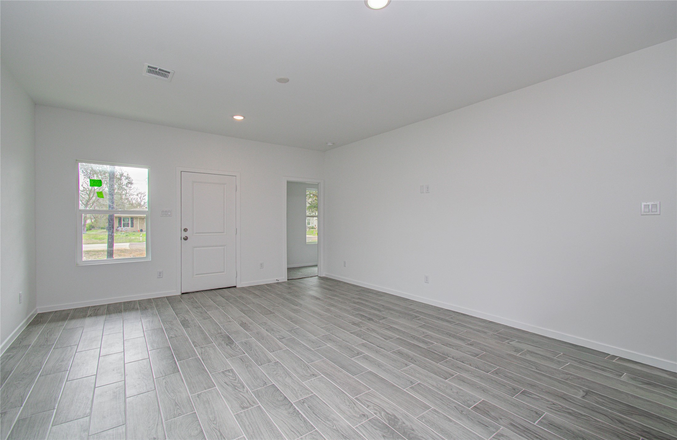 211 19th Hempstead, TX 77445 - Photo 9 of 21 Living Room
Bright open-concept living area designed for comfort and modern living.