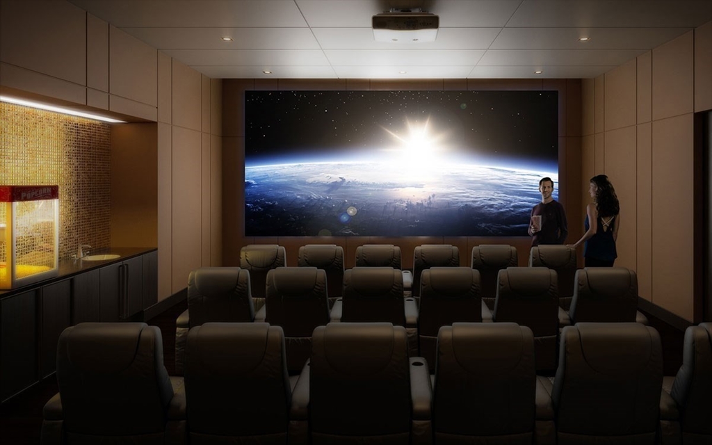 1 Franklin Street, Unit 2409 Boston, MA 02110 - Photo 19 of 19 a media room with lots of chairs and a projector screen