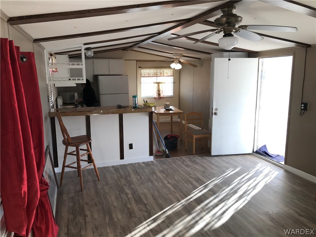 1709 Talc Road Bullhead City, AZ 86442 - Photo 4 of 29 a kitchen with stainless steel appliances granite countertop a refrigerator and a stove