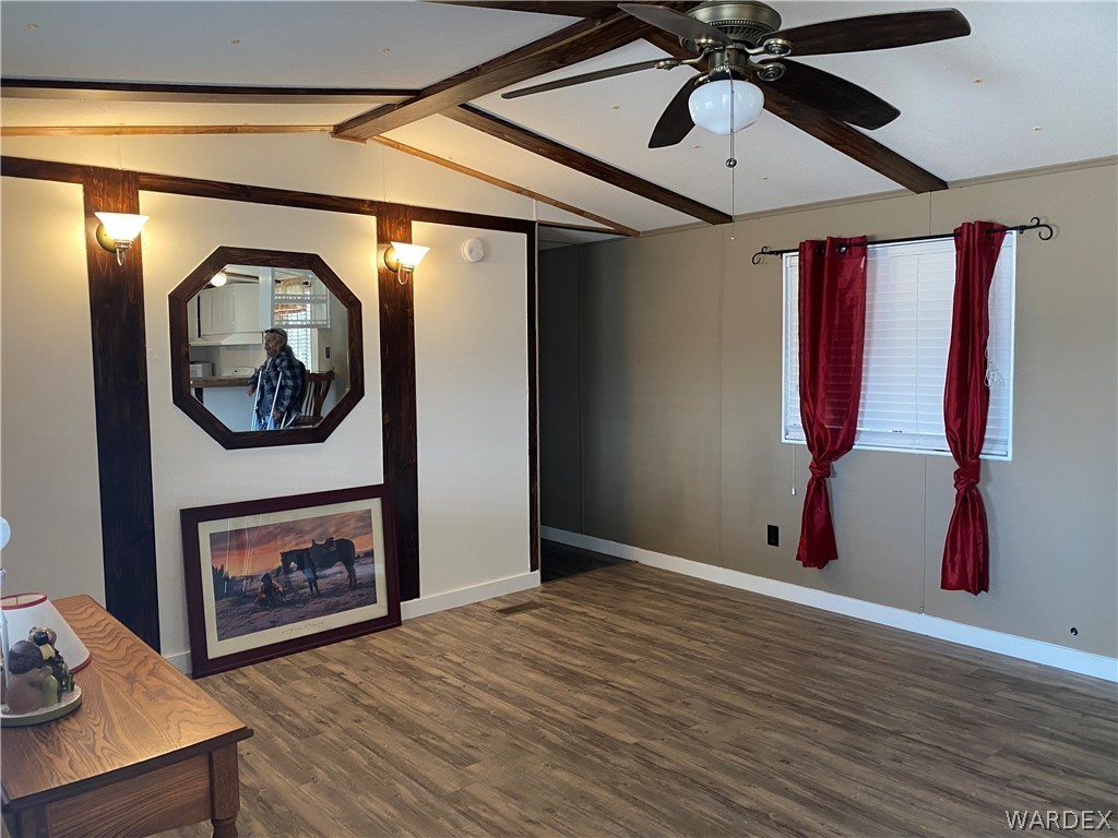 1709 Talc Road Bullhead City, AZ 86442 - Photo 8 of 29 a view of a hallway with wooden floor and staircase