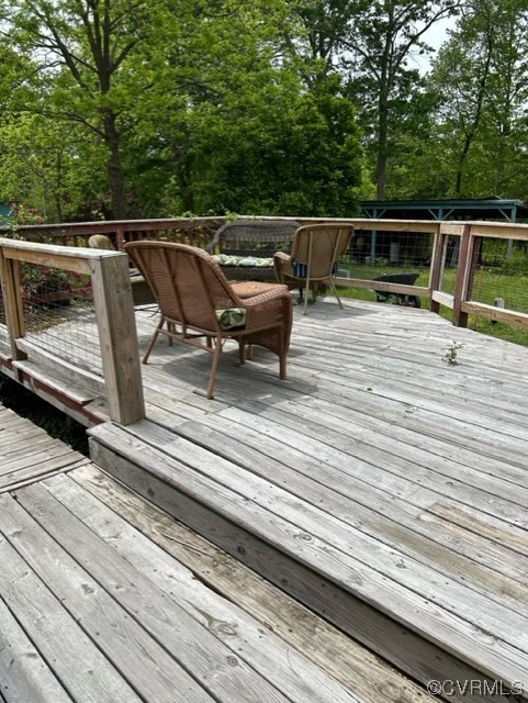 1933 South Genito Road Burkeville, VA 23922 - Photo 13 of 25 a terrace view with sitting space and garden view