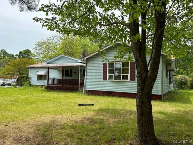 1933 South Genito Road Burkeville, VA 23922 - Photo 4 of 25 a front view of a house with garden