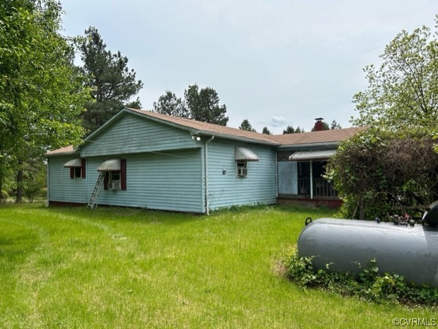1933 South Genito Road Burkeville, VA 23922 - Photo 5 of 25 a front view of a house with garden