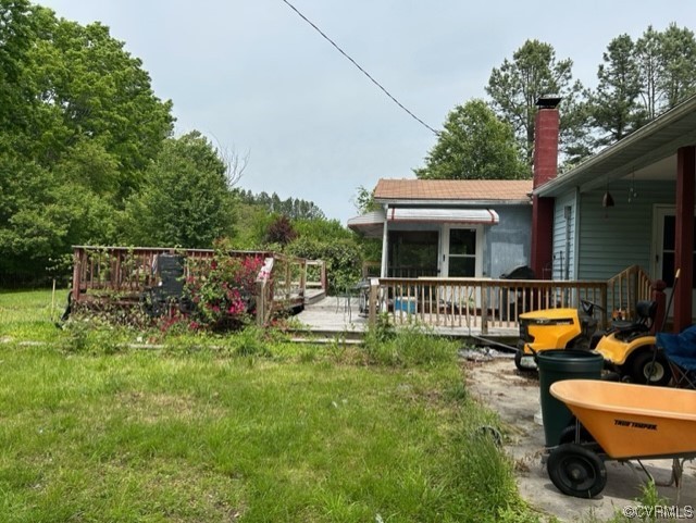 1933 South Genito Road Burkeville, VA 23922 - Photo 7 of 25 an outdoor sitting area with furniture and garden