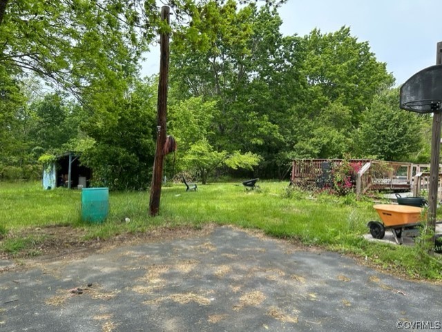 1933 South Genito Road Burkeville, VA 23922 - Photo 8 of 25 a view of a garden with large trees
