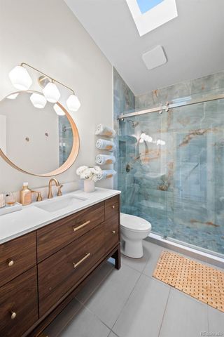 a bedroom with a bed and a view of bedroom