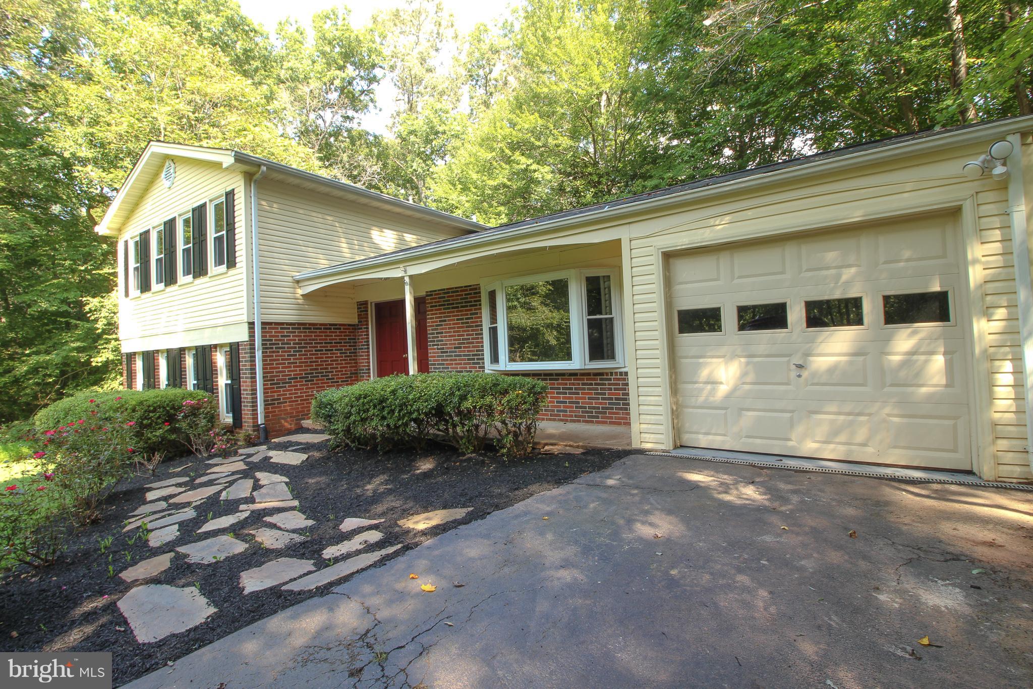11913 Smithfield Road Manassas, VA 20112 - Photo 3 of 26 Private driveway with garage