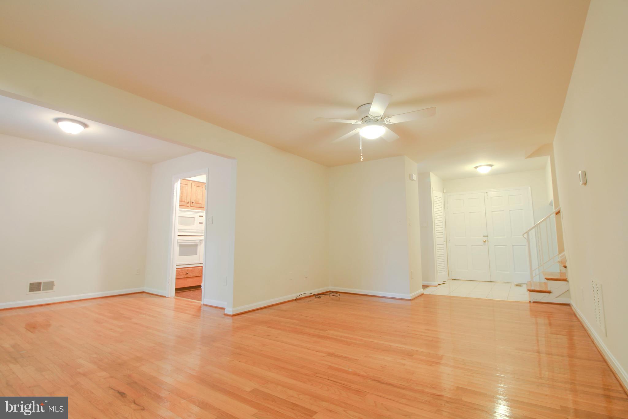 11913 Smithfield Road Manassas, VA 20112 - Photo 6 of 26 Open living room and dining room