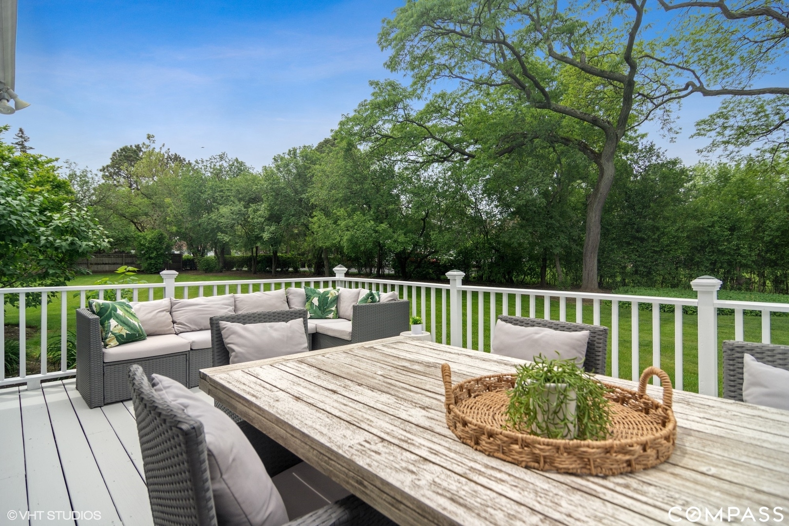 1030 Inverlieth Road Lake Forest, IL 60045 - Photo 23 of 30 a balcony with wooden floor table and chairs