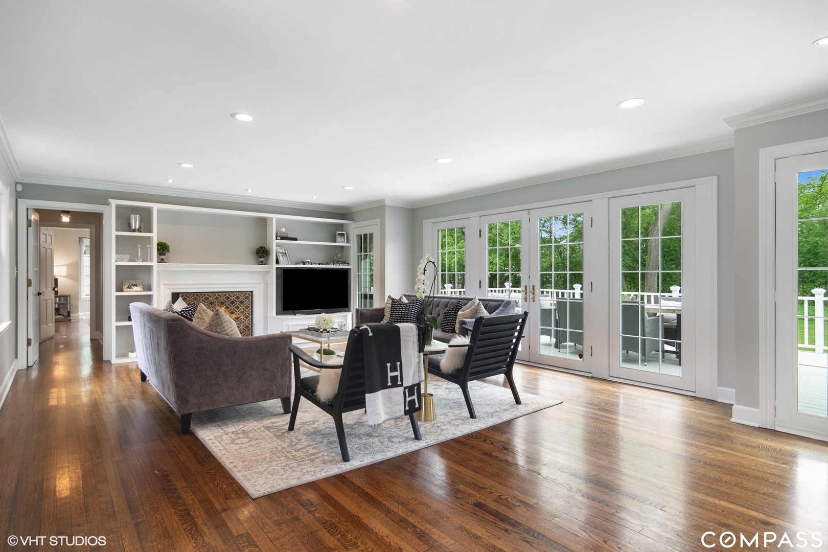 1030 Inverlieth Road Lake Forest, IL 60045 - Photo 3 of 30 a living room with fireplace furniture and a wooden floor