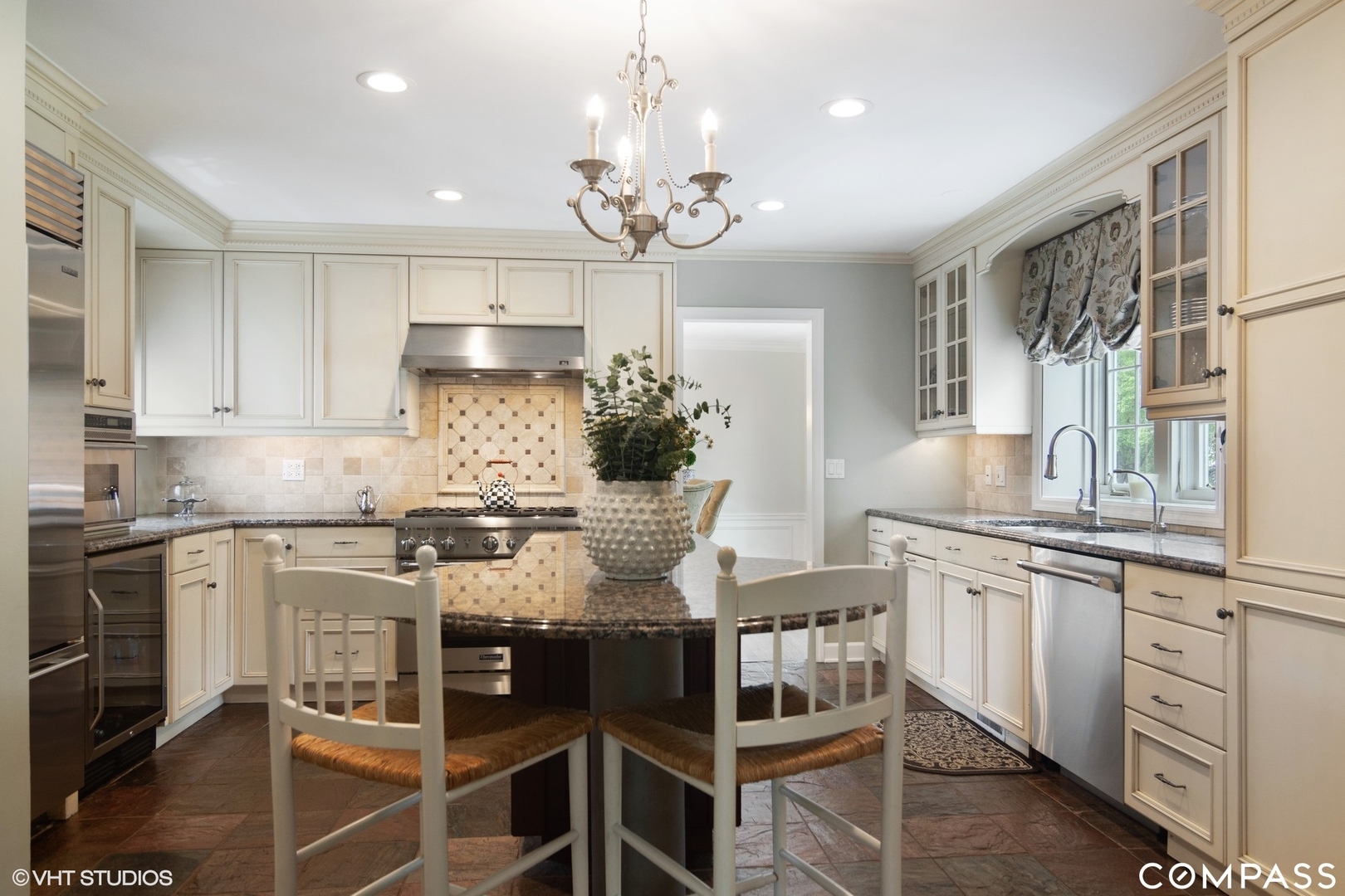 1030 Inverlieth Road Lake Forest, IL 60045 - Photo 5 of 30 a kitchen with cabinets a sink and appliances