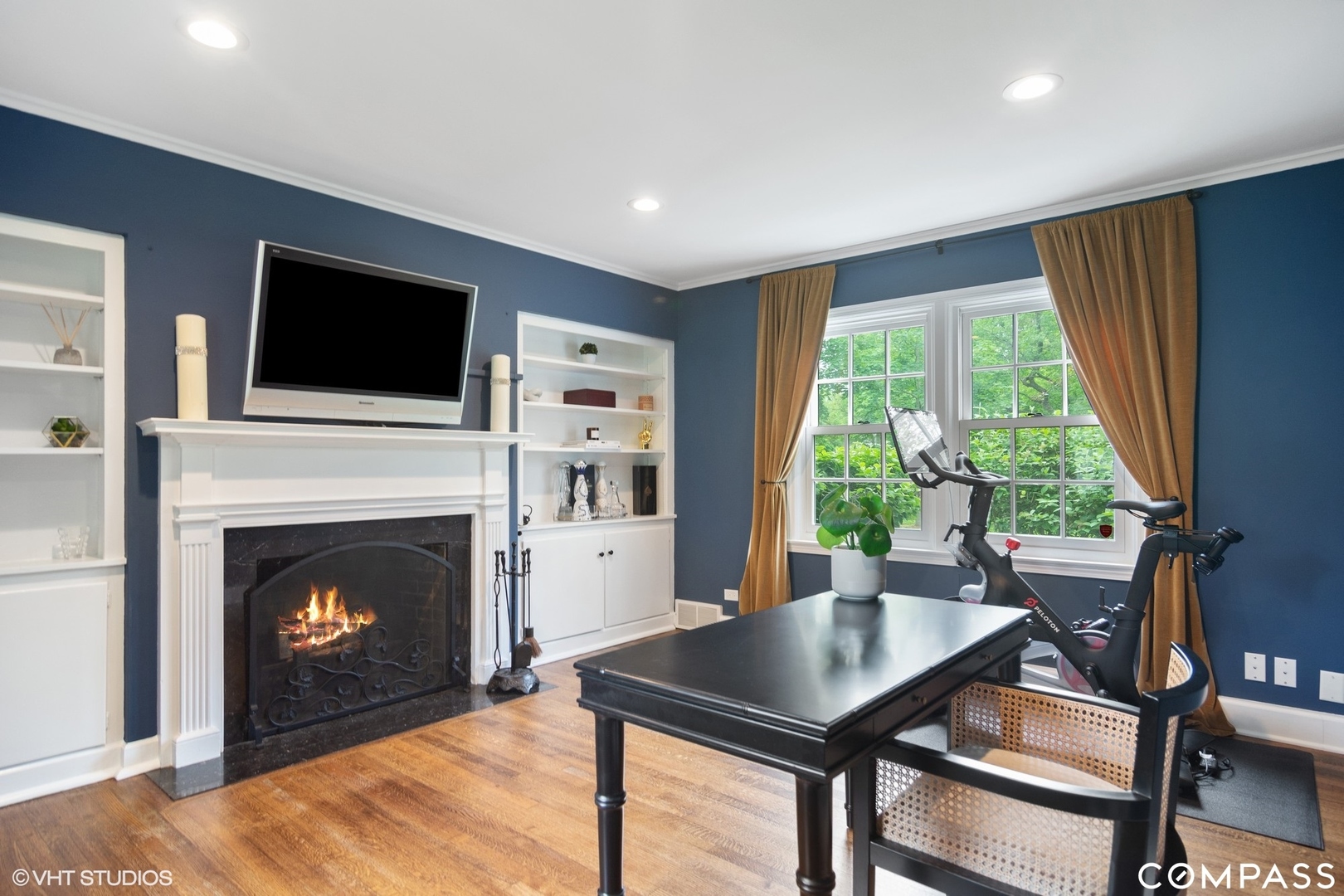 1030 Inverlieth Road Lake Forest, IL 60045 - Photo 10 of 30 a living room with furniture a flat screen tv and a fireplace