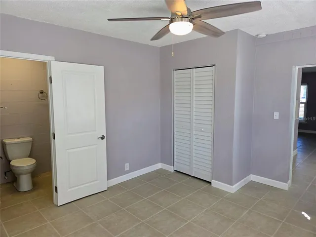 a view of a bathroom with a sink and a mirror