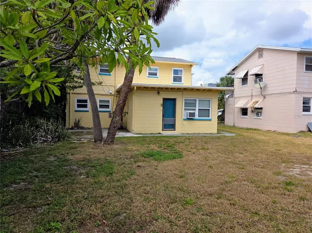 a house with trees in front of it