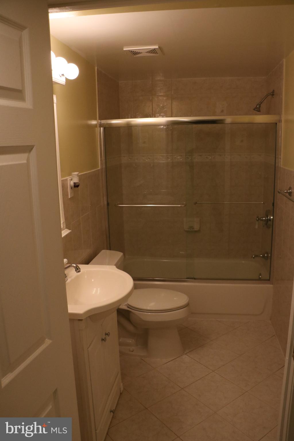7912 Bubbling Brook Circle Springfield, VA 22153 - Photo 11 of 18 Full bathroom off the laundry room
