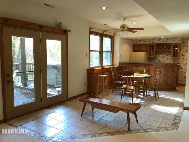 8 Heatherdowns Lane Galena, IL 61036 - Photo 19 of 39 a dining room with furniture and window