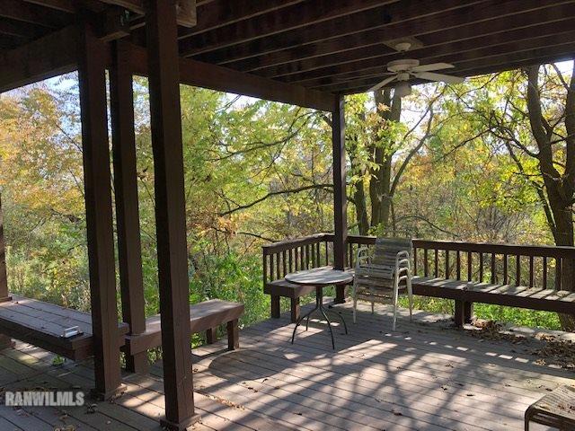 8 Heatherdowns Lane Galena, IL 61036 - Photo 23 of 39 a view of a porch with furniture and a yard