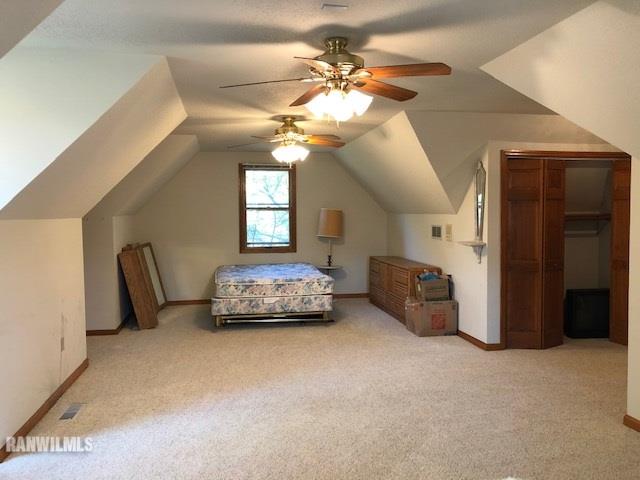 8 Heatherdowns Lane Galena, IL 61036 - Photo 31 of 39 a living room with furniture and a chandelier