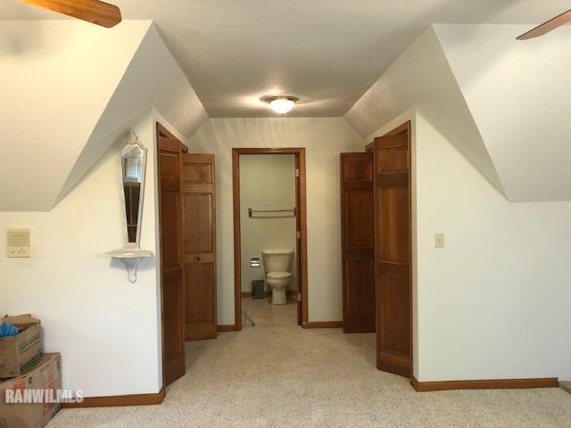 8 Heatherdowns Lane Galena, IL 61036 - Photo 32 of 39 a view of a hallway with closet and a bathroom