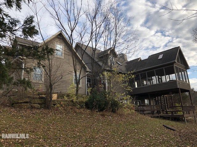 8 Heatherdowns Lane Galena, IL 61036 - Photo 37 of 39 a view of a house with a yard