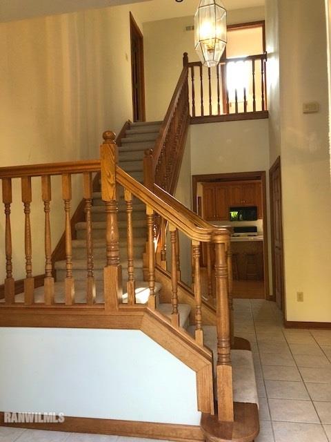 8 Heatherdowns Lane Galena, IL 61036 - Photo 7 of 39 a view of entryway and hall with wooden floor