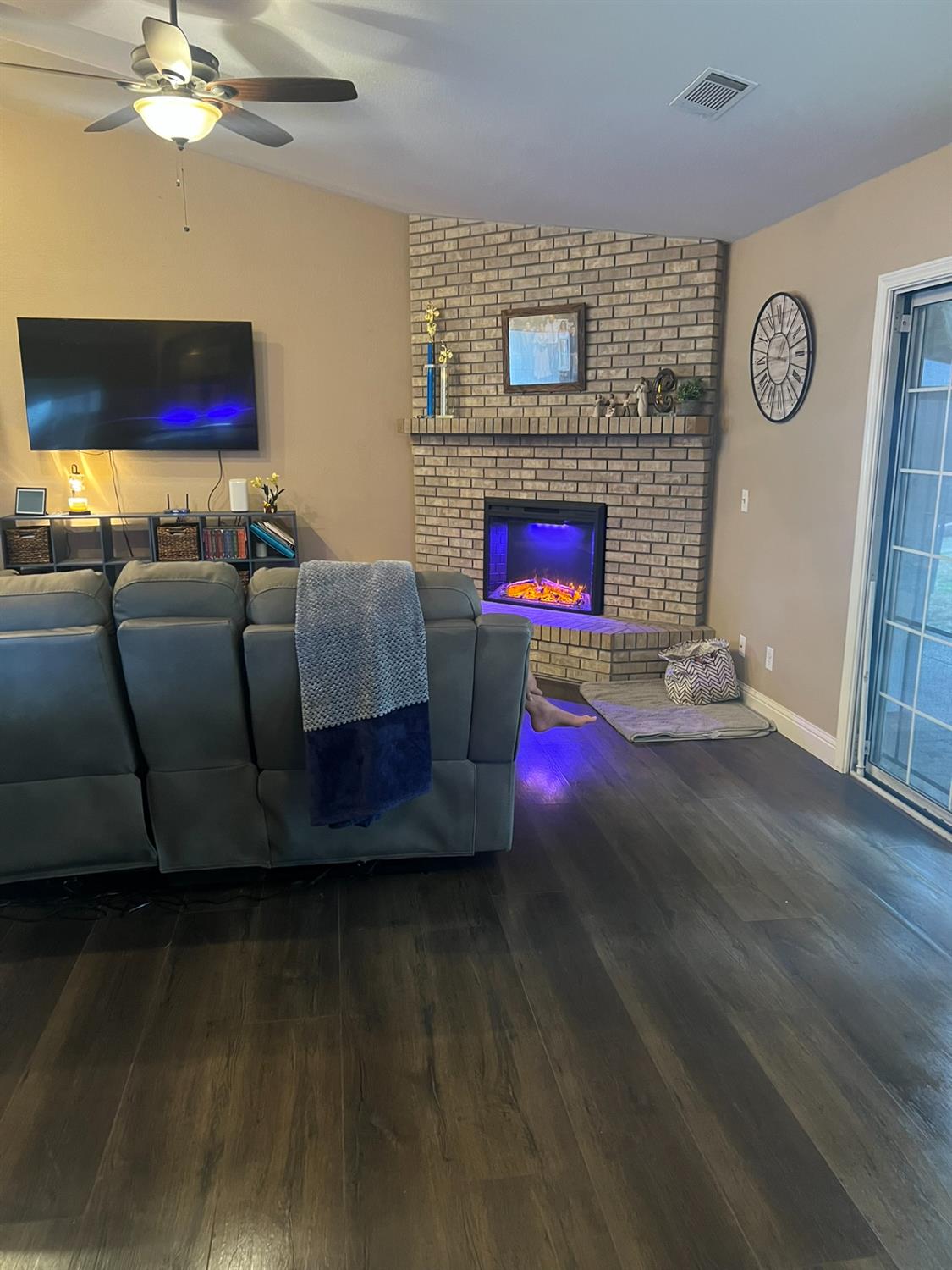 1143 Brownie Court Merced, CA 95340 - Photo 16 of 27 a living room with furniture and a fireplace