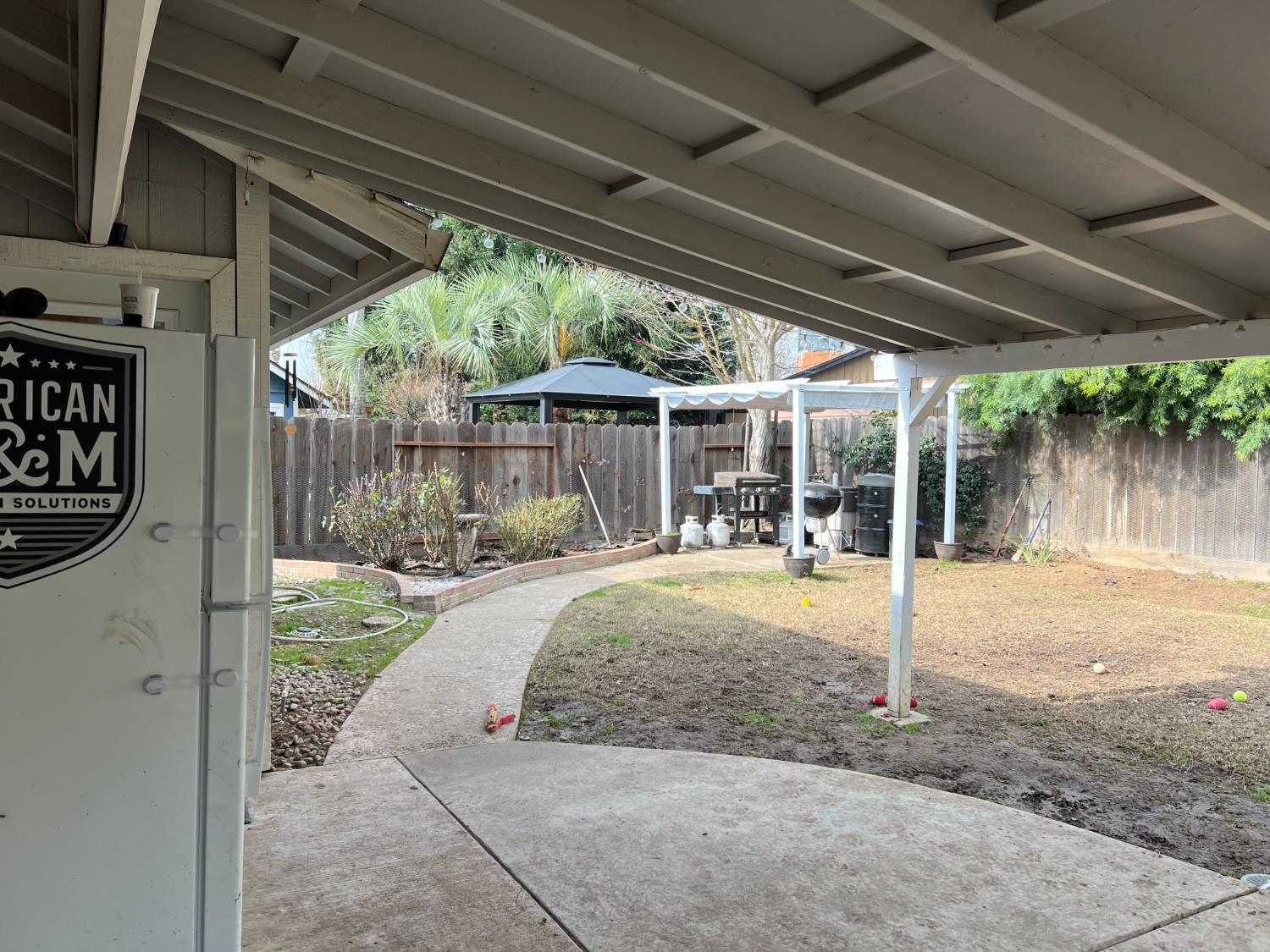 1143 Brownie Court Merced, CA 95340 - Photo 25 of 27 a house with yard in front of it