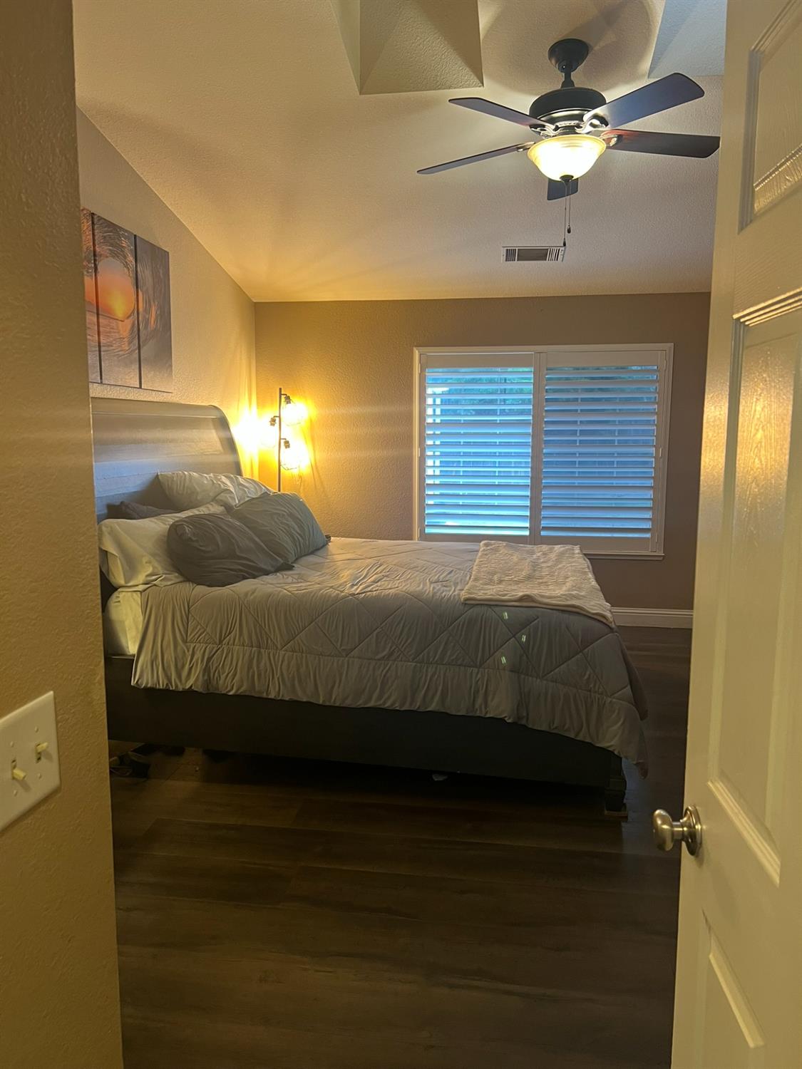 1143 Brownie Court Merced, CA 95340 - Photo 7 of 27 a bedroom with a bed dresser and a window