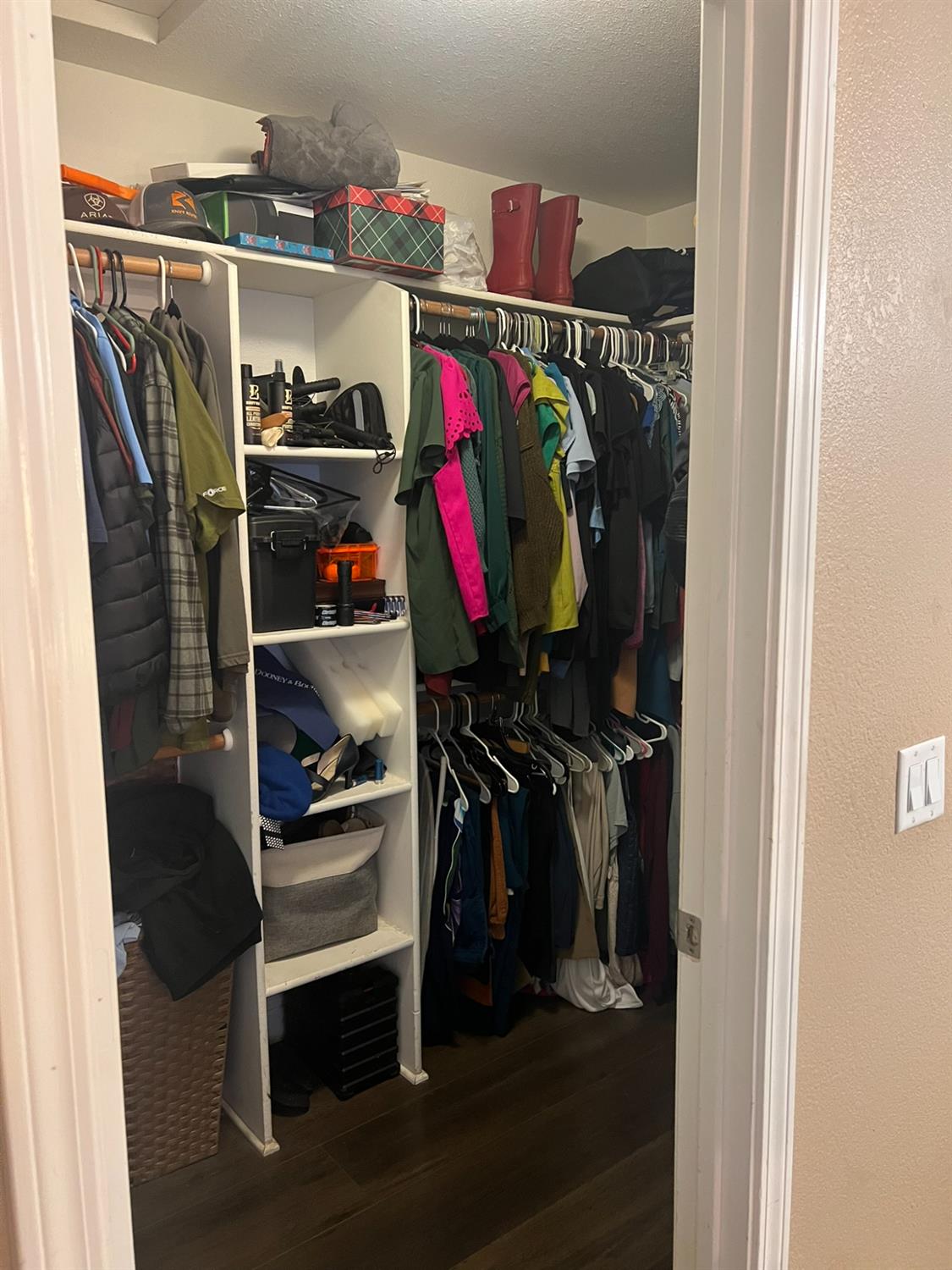1143 Brownie Court Merced, CA 95340 - Photo 10 of 27 a view of walk in closet with clothes and shoes