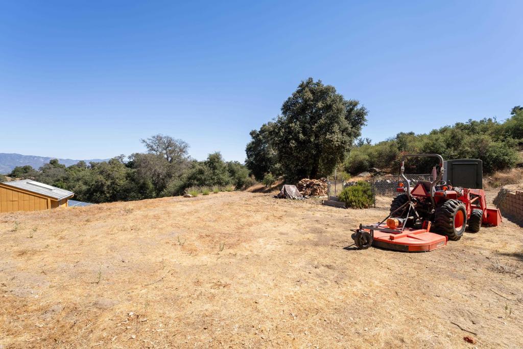 25770 East Grade Road Santa Ysabel, CA 92070 - Photo 45 of 75 a view of a backyard of a house