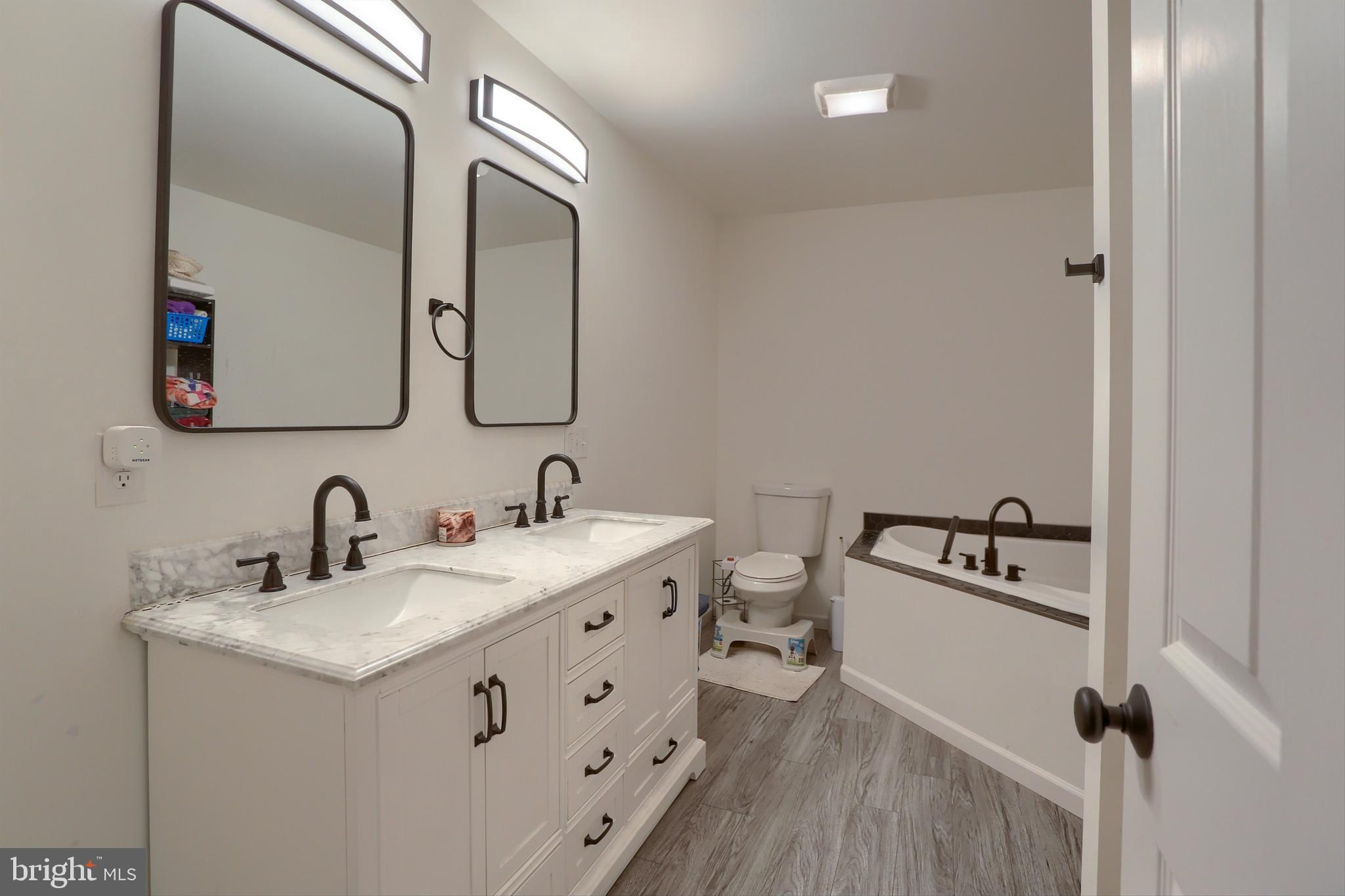 405 Small Valley Road Halifax, PA 17032 - Photo 25 of 36 a bathroom with a sink and a mirror