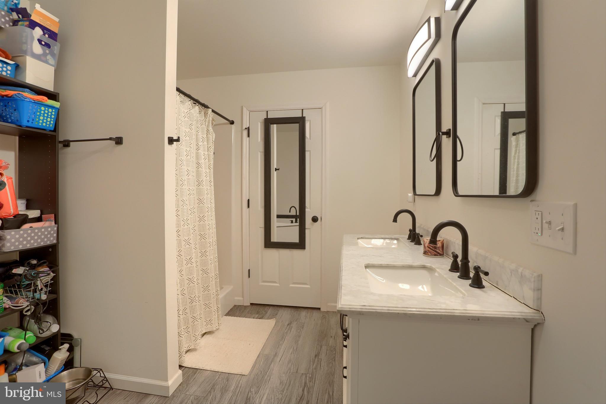 405 Small Valley Road Halifax, PA 17032 - Photo 30 of 36 a bathroom with a sink and a mirror
