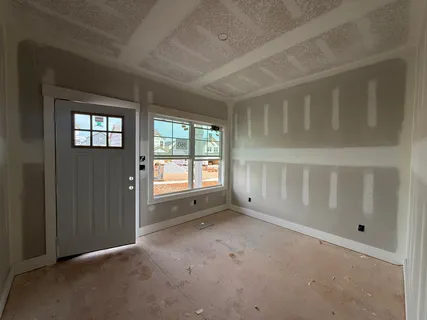an empty room with windows