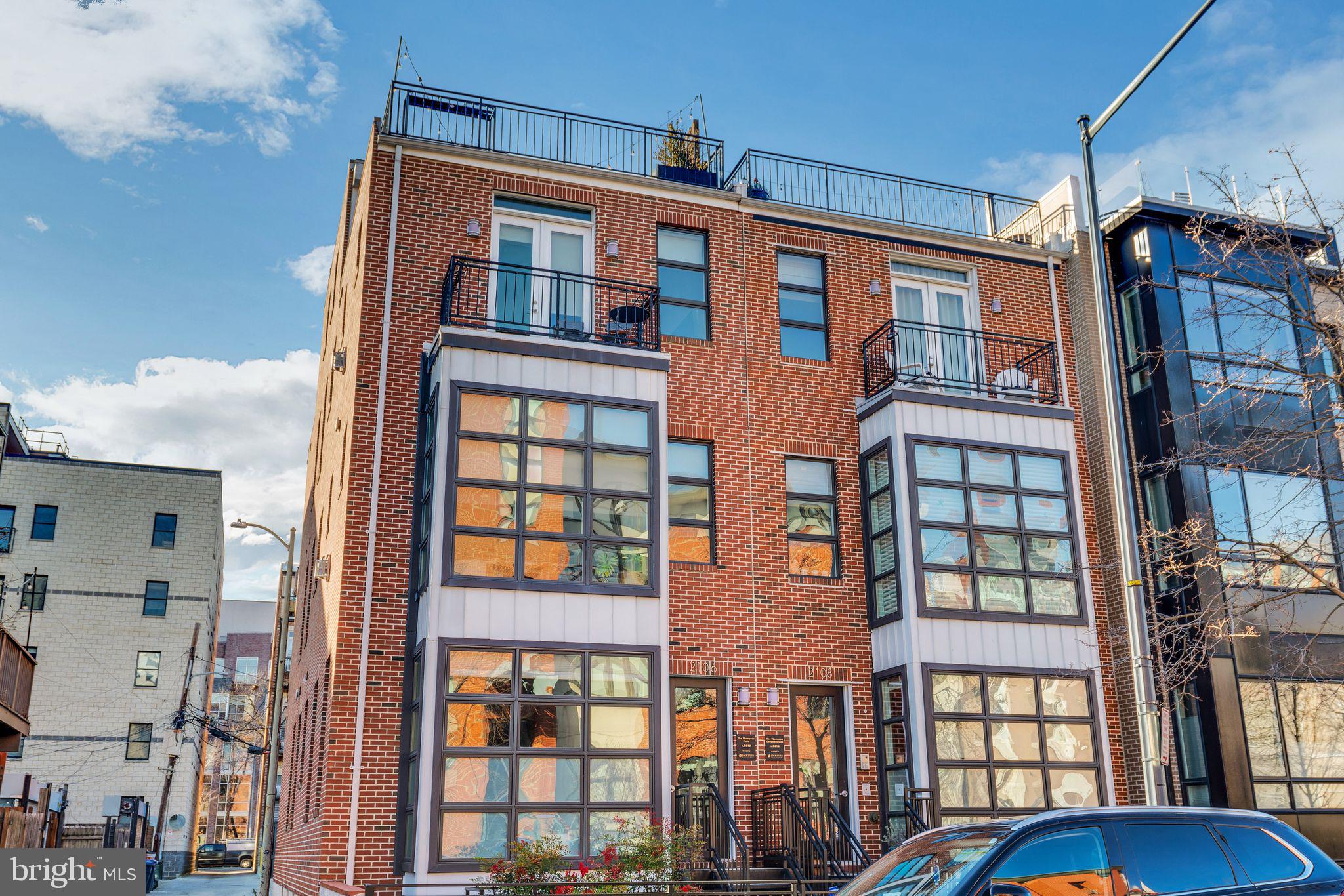 2106 10th Street Northwest, Unit 1 Washington, DC 20001 - Photo 31 of 31 a front view of a multi story building