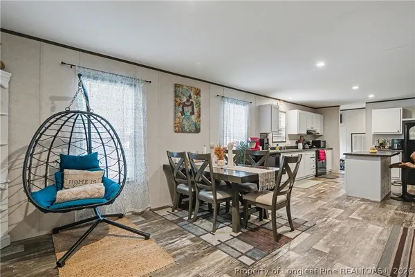 a view of a dining room with furniture