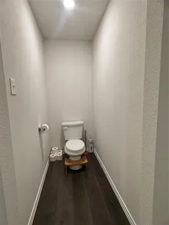 a bathroom with a sink vanity and a mirror