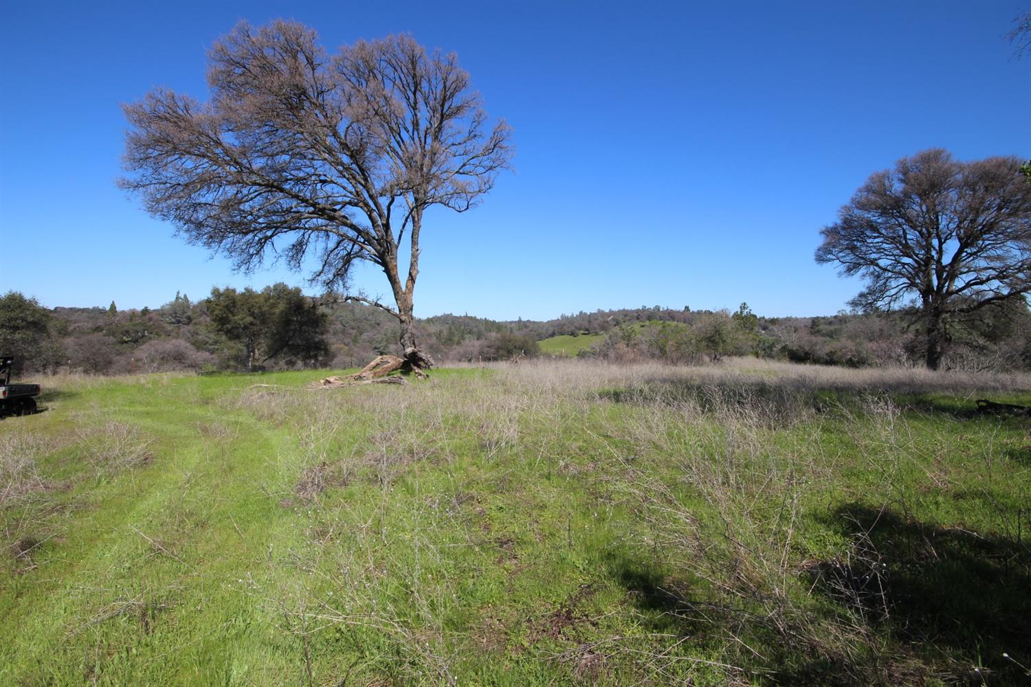 10650 Werner Road Auburn, CA 95603 - Photo 32 of 50 a view of lake with mountain in the background