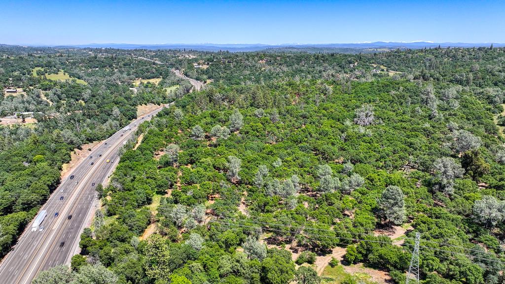 10650 Werner Road Auburn, CA 95603 - Photo 46 of 50 a view of a city with lush green forest