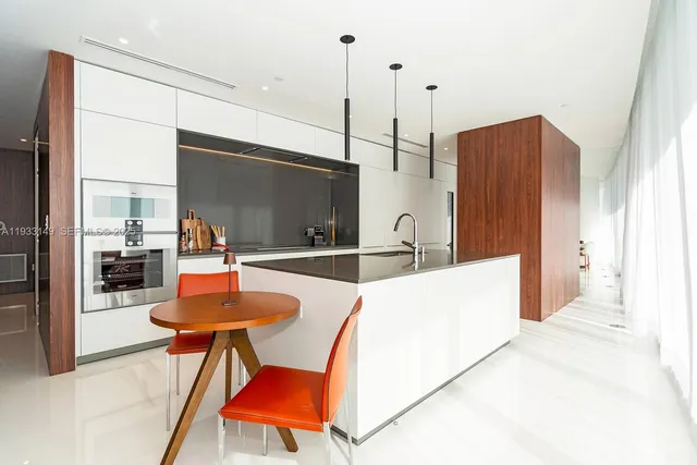 a view of a hallway with stairs