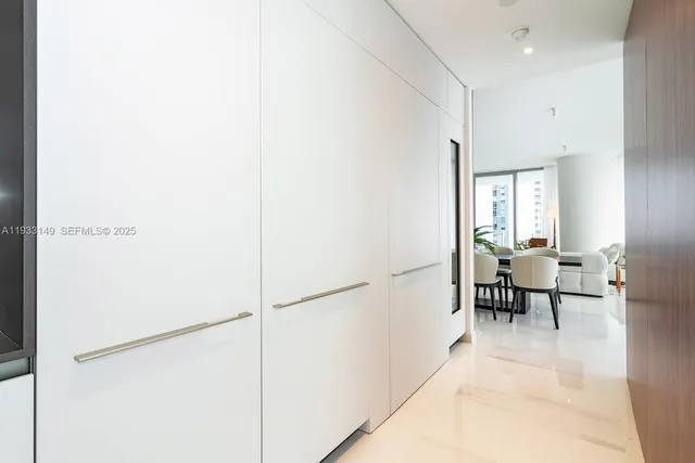 a bedroom with a bed and a lamp