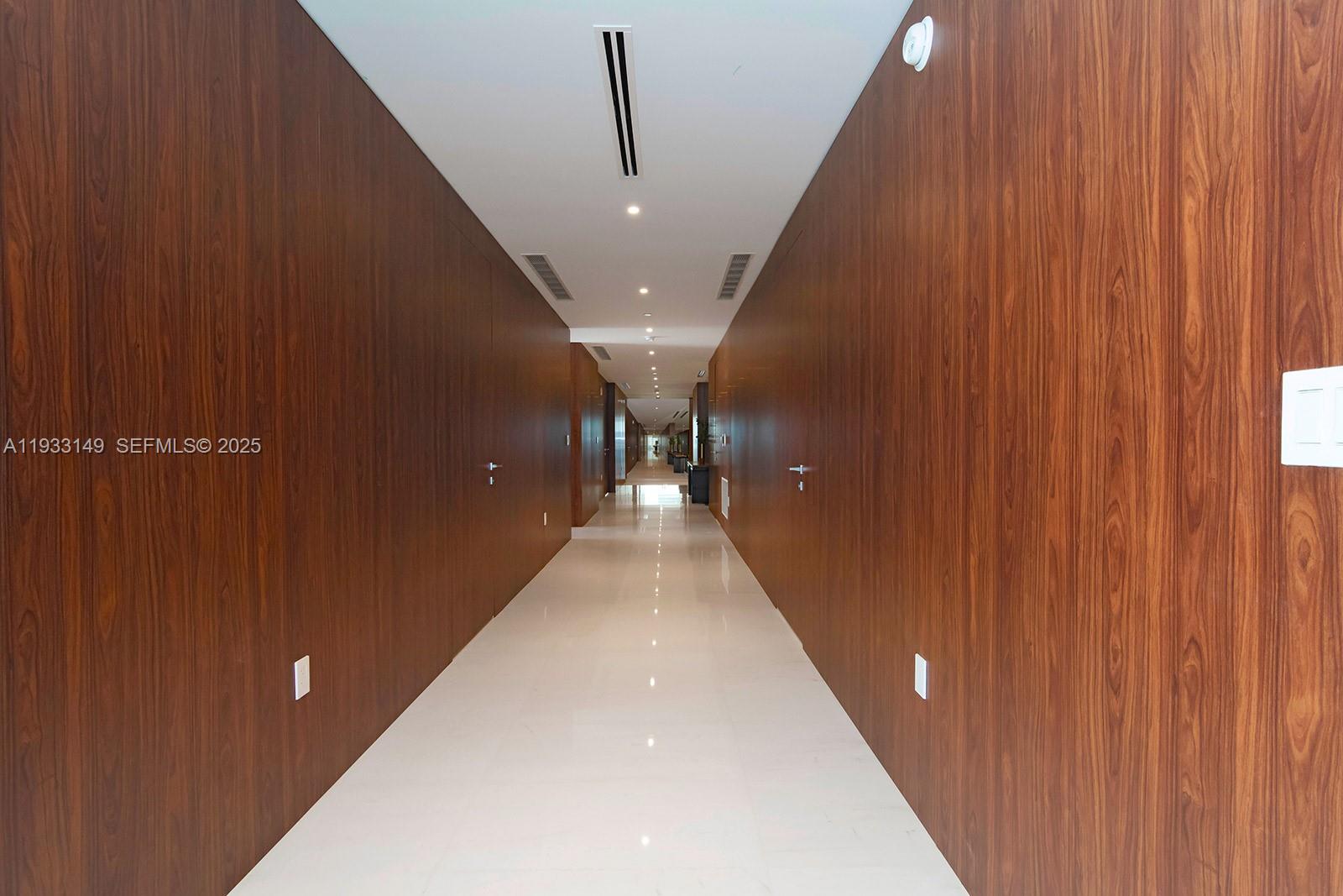 300 Biscayne Blvd Way, Unit 1901 Miami, FL 33131 - Photo 24 of 57 a view of a hallway with stairs